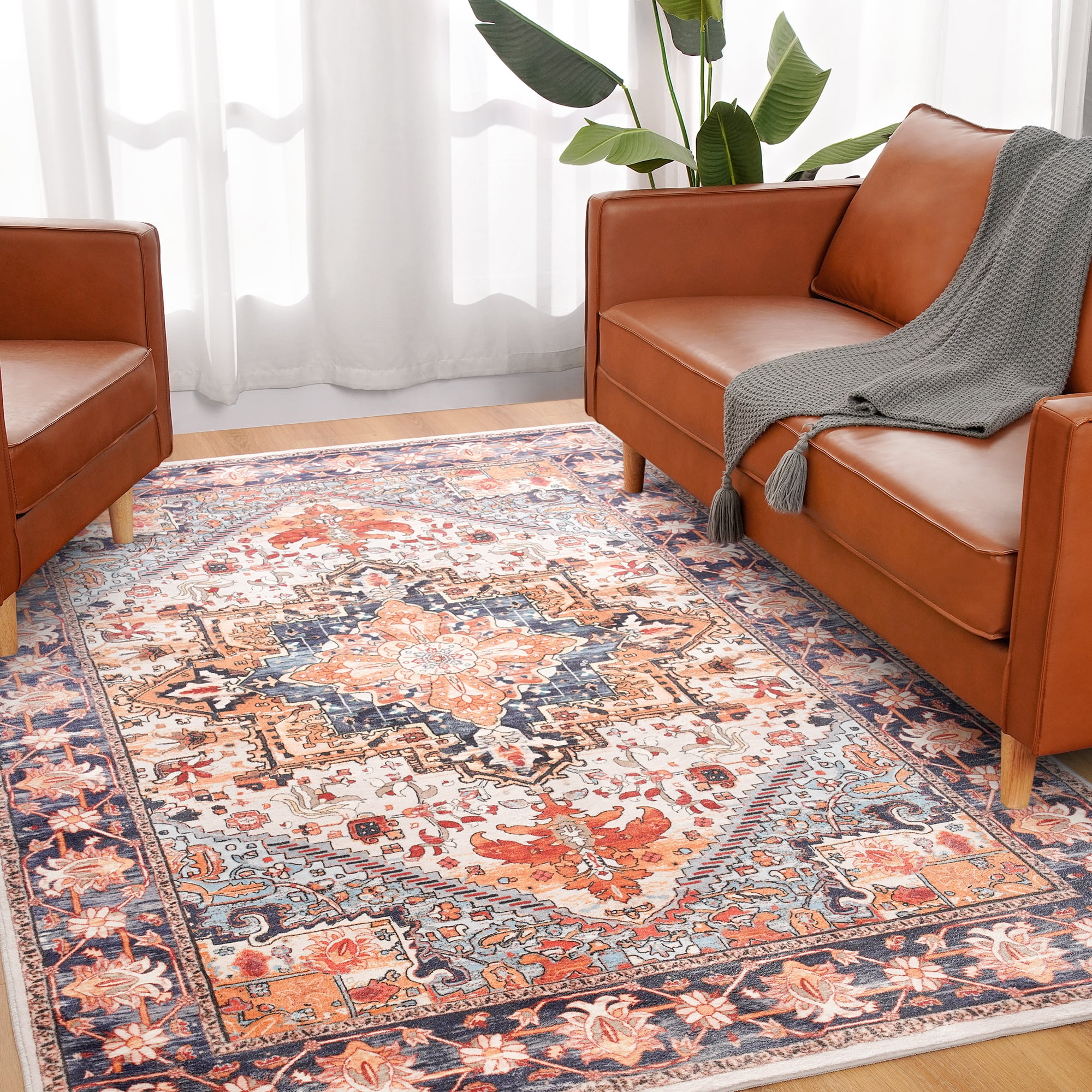 Vintage Boho 4' x 6' Blue and Orange Synthetic Area Rug