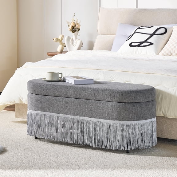 Noble House Ciara 39" Oval Upholstered Storage Ottoman, Lift Top Bench with Boho Fringe Trim, Multi-Functional Footrest, Gray