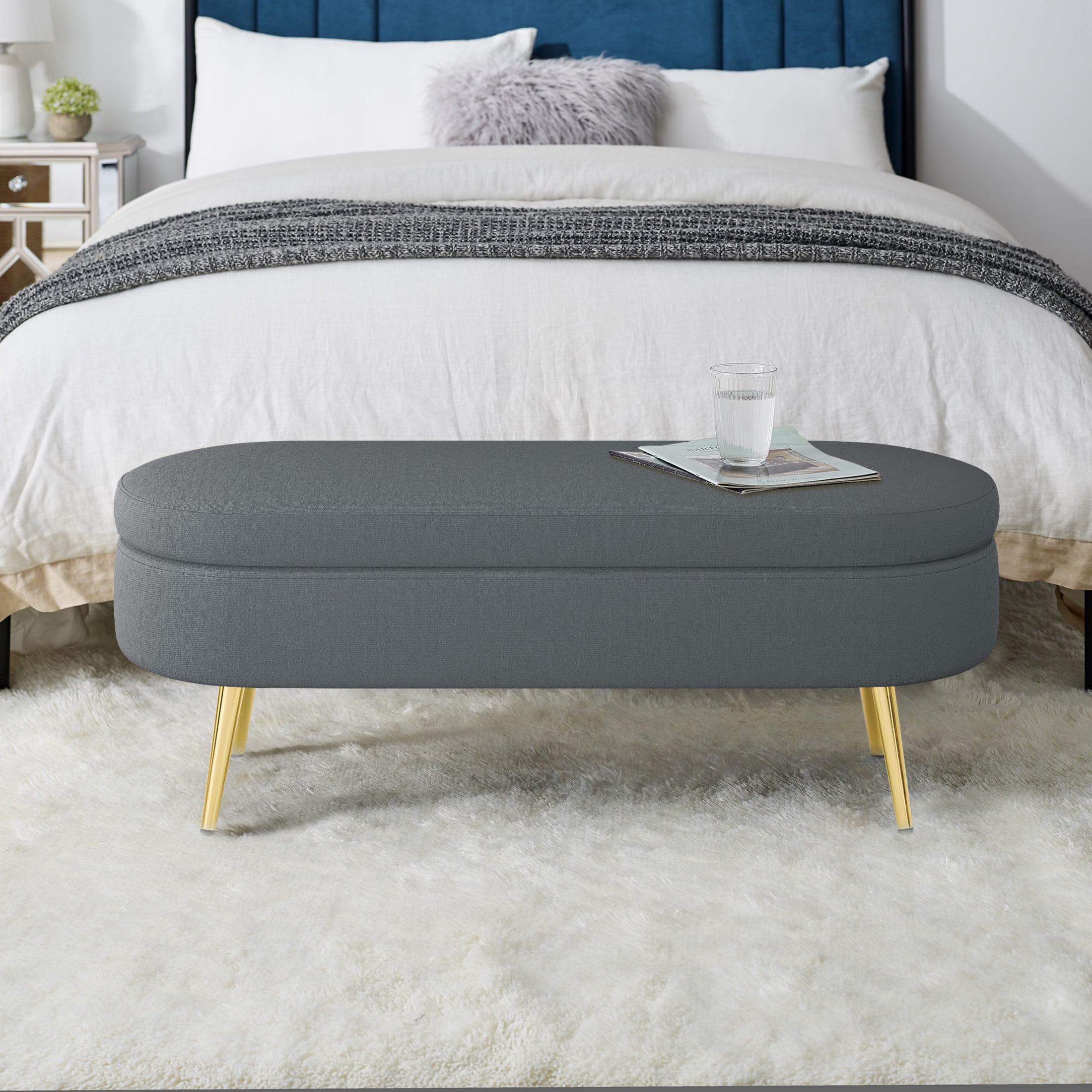 Noble House Dyani 43" Oval Flannel Storage Ottoman Bench, Upholstered Footrest with Metal Legs, Dark Gray