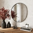thumbnail image 1 of Noire Black Abstract Metal Round Modern Wall Mirror, 1 of 6