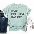thumbnail image 1 of Nope Still Not Married T-shirt Women's Bachelor Shirt Thanksgiving Tshirt Holiday Tee Engagement Top Grateful Gift Single Shirts, 1 of 3