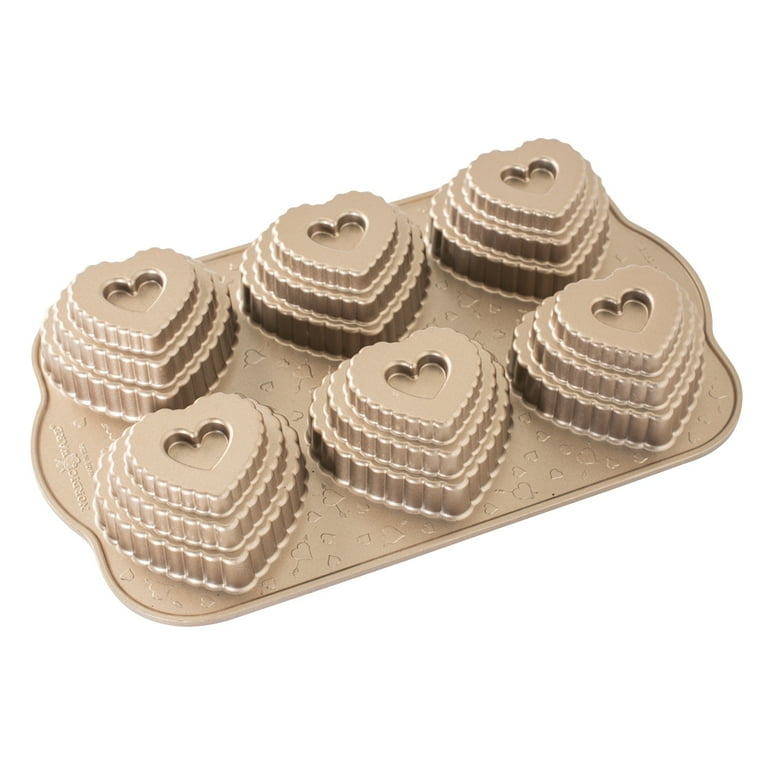 https://i5.walmartimages.com/seo/Nordic-Ware-Tiered-Heart-Cakelet-Muffin-Pan-Cast-Aluminum-Rose-Gold-11-8-L-x-7-3-W-x-1-7-H_5ed6dc87-559c-4661-bd79-2b4429daaf2f.e92740905d6331e26209ed1ac3a3bccc.jpeg?odnHeight=768&odnWidth=768&odnBg=FFFFFF