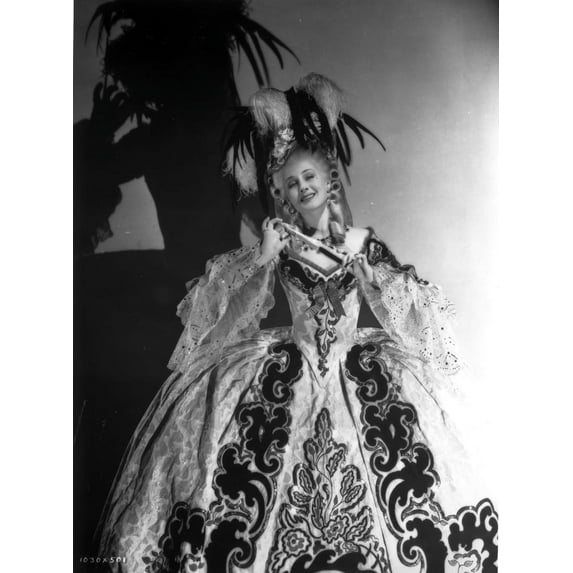 Norma Shearer standing in Ball Gown Photo Print (24 x 30)