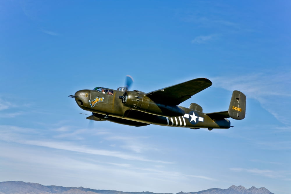 North American B-25G Mitchell bomber in flight near Mesa Arizona Canvas Art - Scott GermainStocktrek Images (35 x 23)