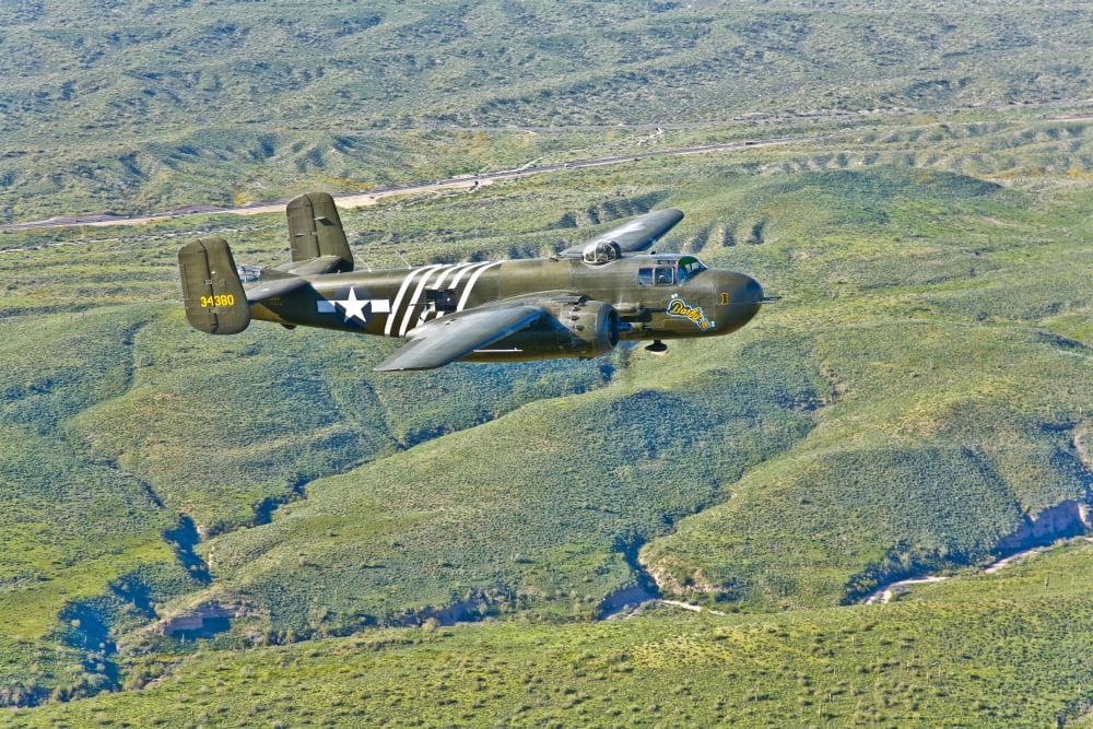 North American B-25G Mitchell bomber in flight near Mesa Arizona Canvas Art - Scott GermainStocktrek Images (35 x 23)