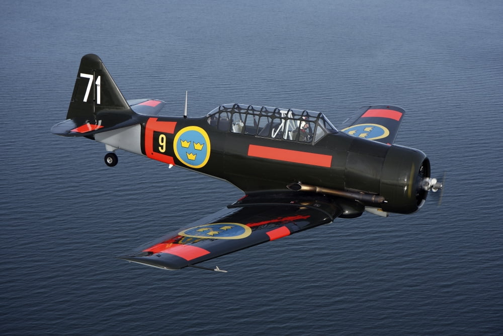 North American T-6TexanHarvard trainer warbird in Swedish Air Force colors Canvas Art - Daniel KarlssonStocktrek Images (35 x 24)