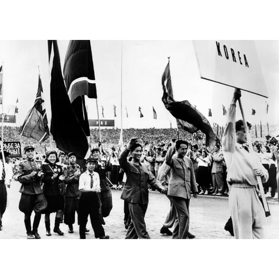 North Korean Delegates To The Communist World Youth Festival. Some Of The Koreans Wear Army Uniforms And Decorations Awarded To Them In The Korean War Against The United Nations. East Berlin. Aug. 8