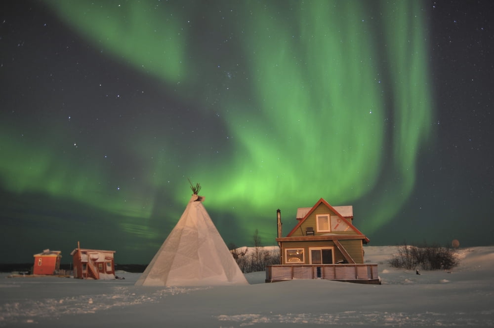 Northern Lights above village Northwest Territories Canada Canvas Art - Jiri HermannStocktrek Images (18 x 12)