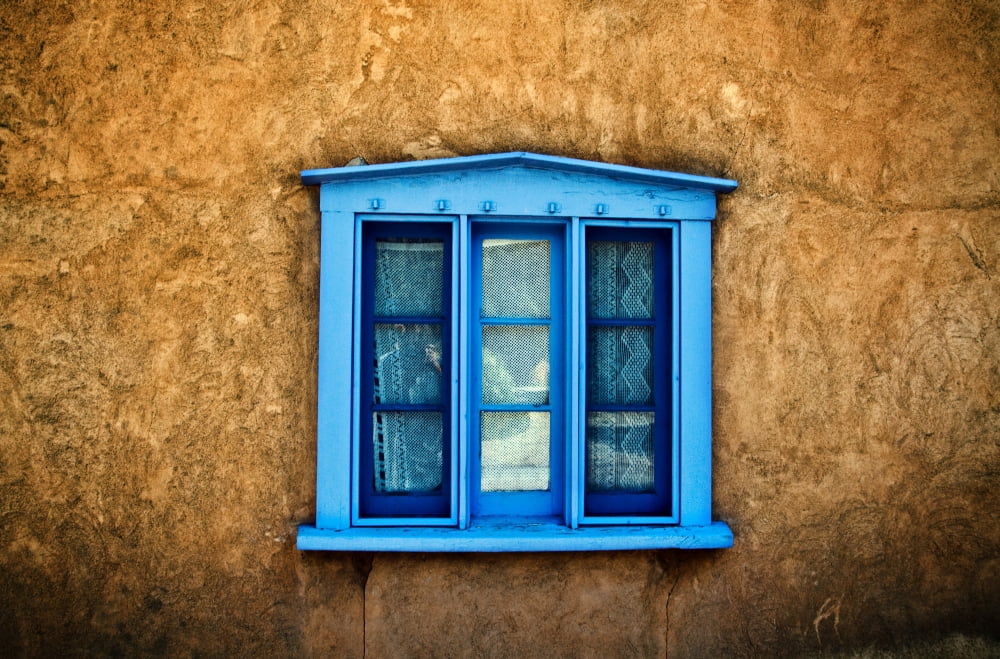 Northern New Mexican Windows New Mexico Blue Deep-Seated Window On Adobe Wall Canvas Art - Ray Laskowitz  Design Pics (34 x 22)