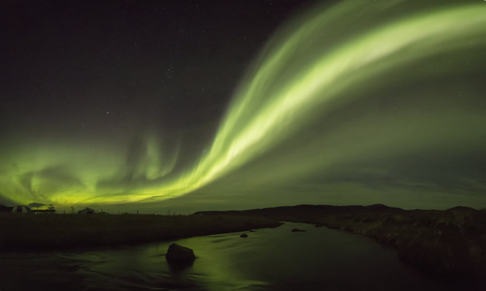 Northern lights over a river and farm in Northeast Iceland Iceland Canvas Art - Robert Postma Design Pics (20 x 12)