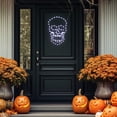 thumbnail image 1 of Northlight LED Lighted 4 Function Skull Halloween Window Decoration - 18", 1 of 10