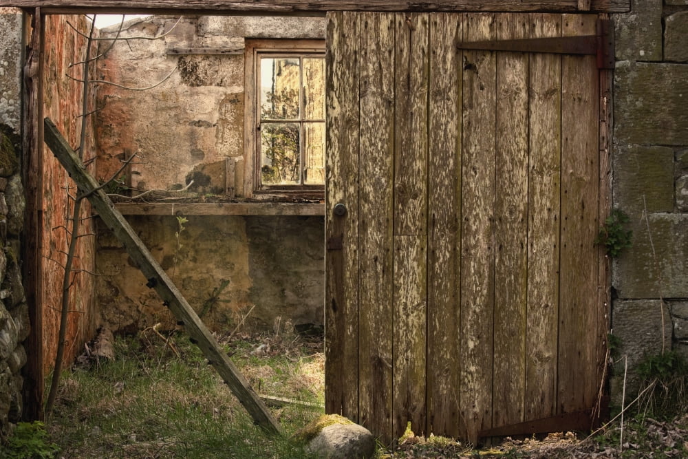 Northumberland England An Abandoned Building In Ruins With A Broken Wooden Door Canvas Art - John Short Design Pics (19 x 12)