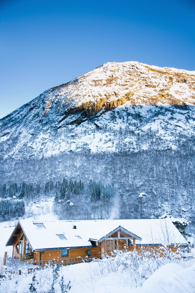 Norway Sognefjord winter wonderland Ortnevik Alpine Log cabin in snow Pine forest Brekke Rental Cabins snow Mountains Winter Alpine scenery Canvas Art - Naki Kouyioumtzis Design Pics (12 x 19)