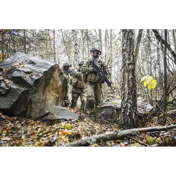 Norwegian Rapid reaction special forces FSK soldiers patrolling in the forest trees. Poster Print by Oleg Zabielin/Stocktrek Images (17 x 11)