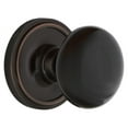 thumbnail image 1 of Nostalgic Warehouse Clablk_Dp_Nk Black Porcelain Dummy Door Knob Set - Bronze, 1 of 4