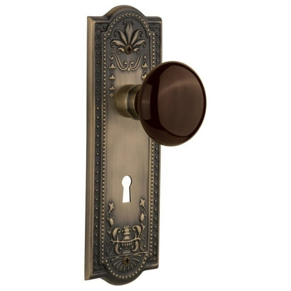 Nostalgic Warehouse Meabrn_Prv_238_Kh Brown Porcelain Solid Brass Privacy Door Knob Set -