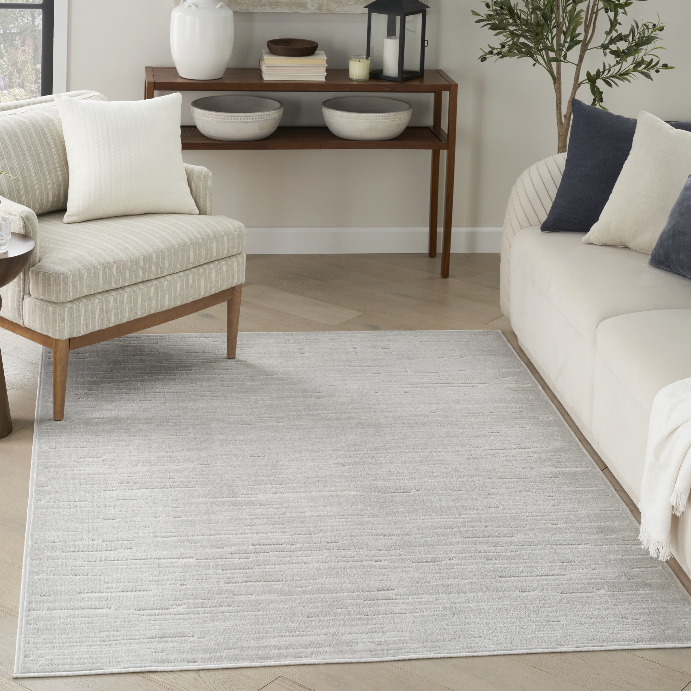 Nourison Care Free 6'7" x 9'2" Light Grey Modern Indoor Rug