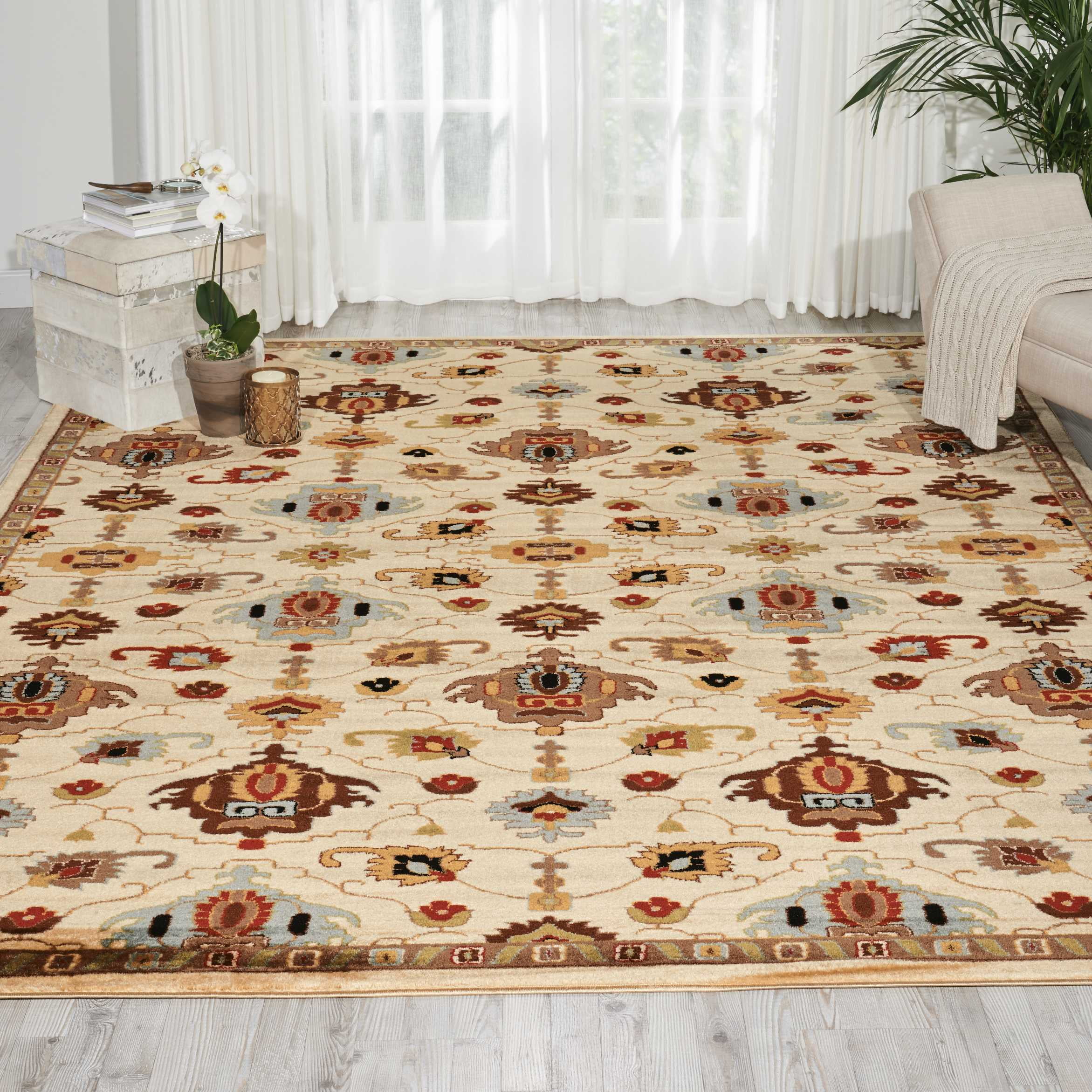 Ivory and White Rectangular Synthetic Area Rug 6'7" x 9'6"