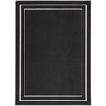 thumbnail image 1 of Nourison Essentials 5' x 7' Black Ivory Contemporary Bordered Indoor/Outdoor Area Rug, 1 of 10
