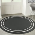 thumbnail image 1 of Nourison Essentials Indoor/Outdoor Black Ivory 6' x round Area Rug, (6 Round), 1 of 9