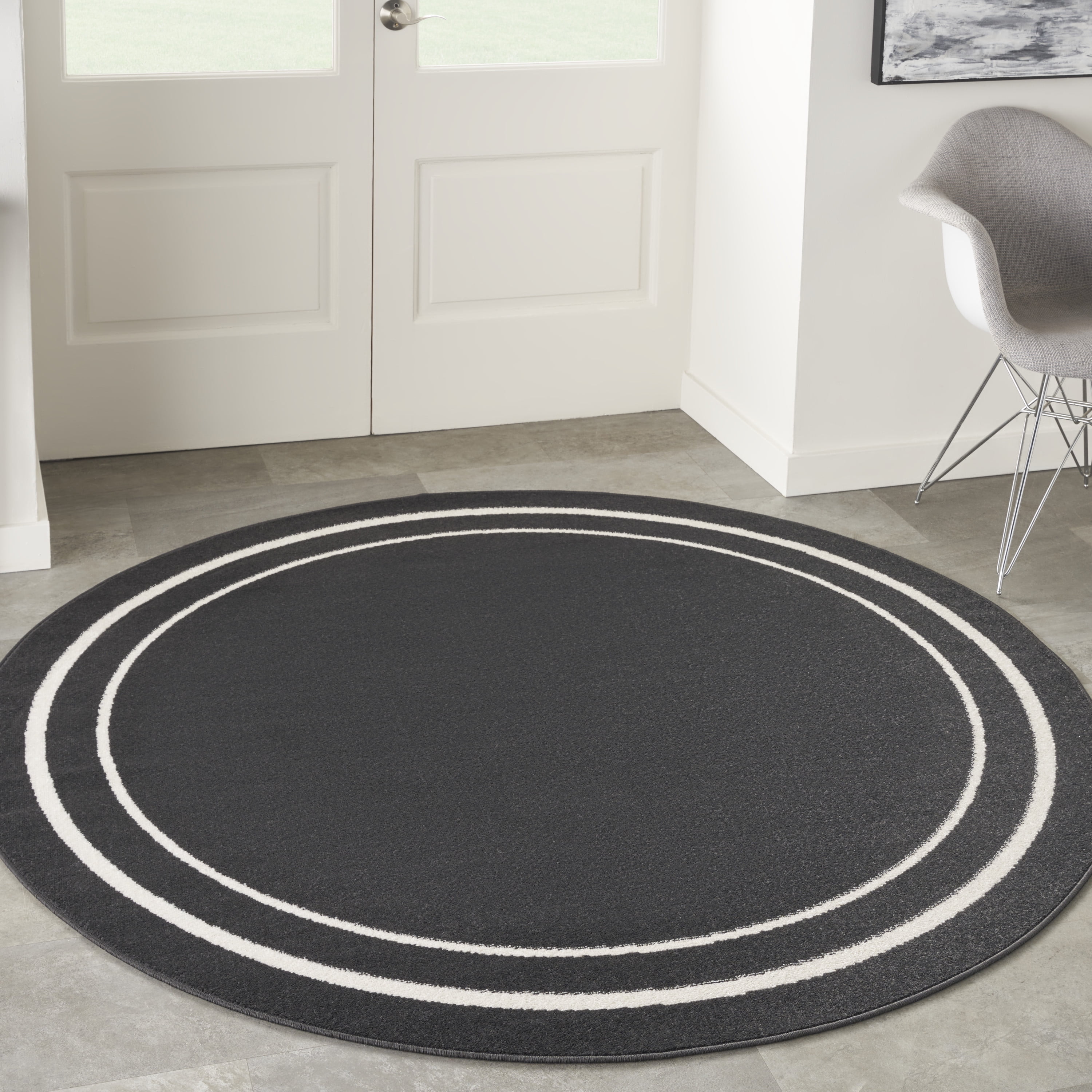Nourison Essentials Indoor/Outdoor Black Ivory 8' Round Polypropylene ...