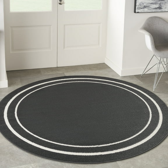 Nourison Essentials Indoor/Outdoor Black Ivory 8' x round Area Rug, (8 Round)