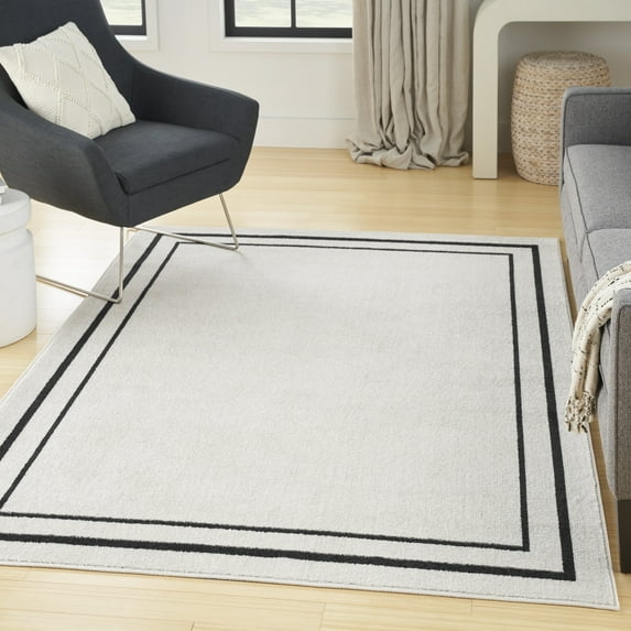 Nourison Essentials Indoor/Outdoor Ivory/Black 4' x 6' Area Rug, (4x16)