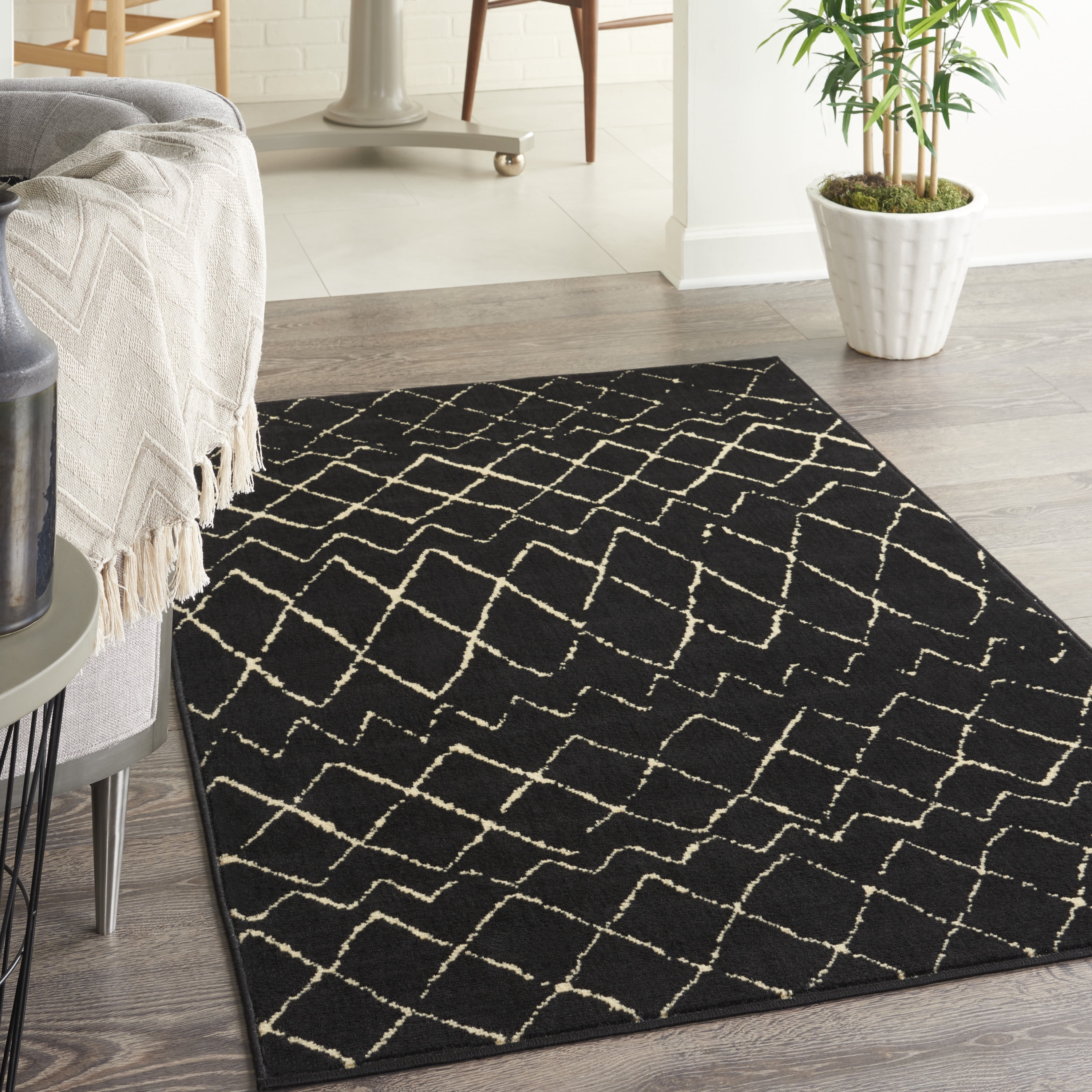 Black and Cream Synthetic Rectangular Area Rug 3'9" x 5'9"