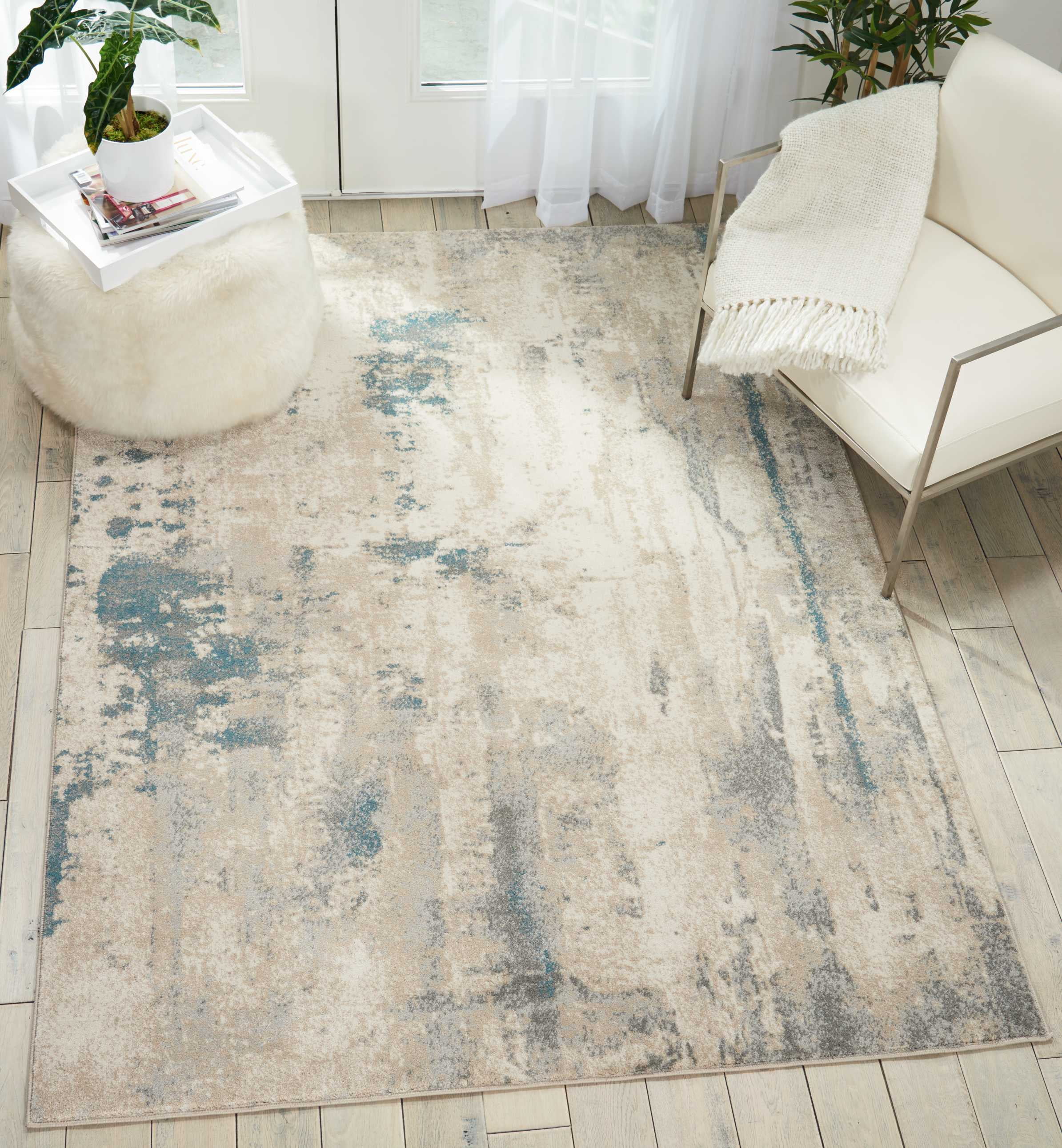 Ivory and Teal Abstract Rectangular Synthetic Rug 9'3" x 12'9"
