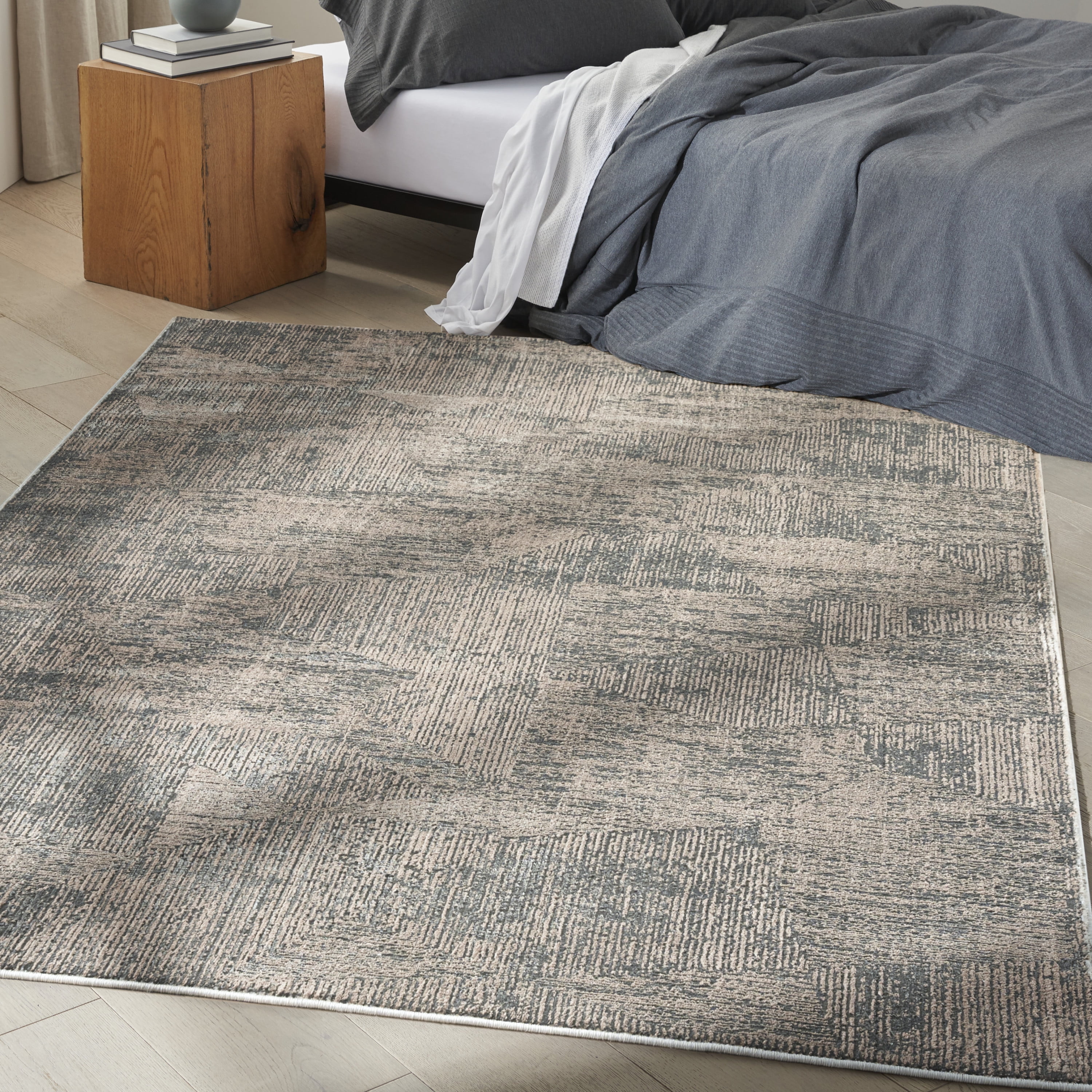 Abstract Black Ivory Synthetic 4' x 6' Easy-Care Area Rug