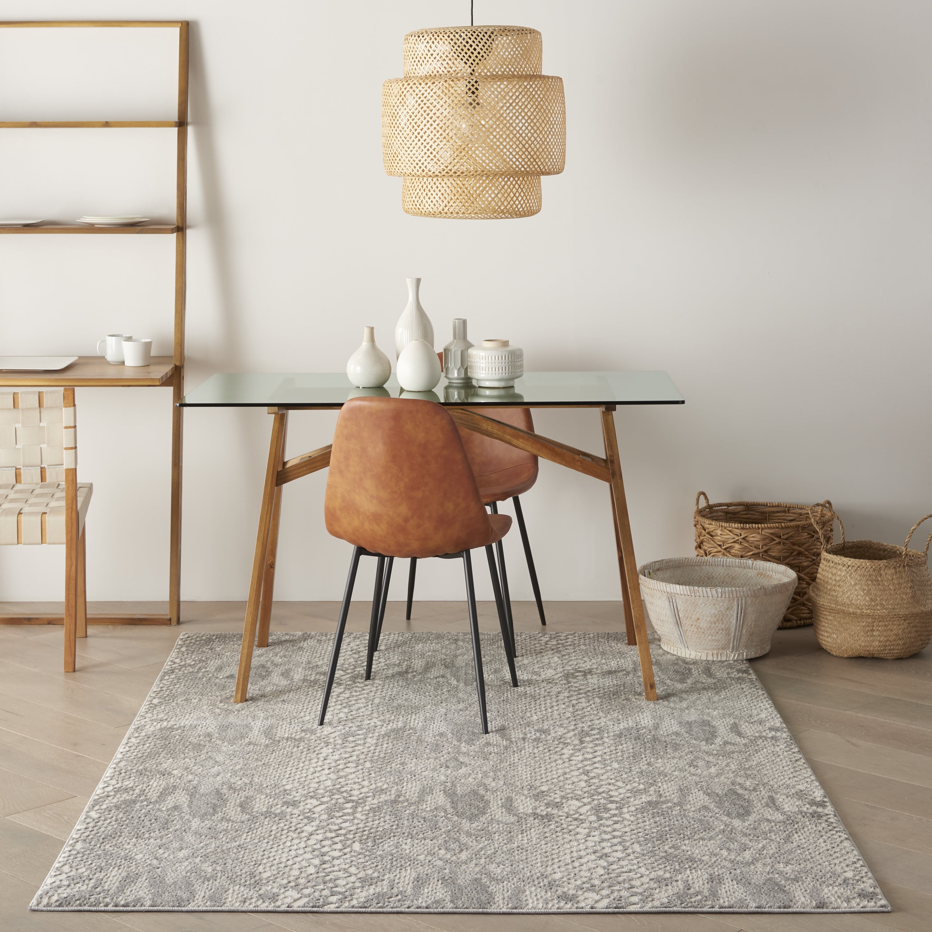Ivory and Grey 5' x 7' Animal Print Synthetic Area Rug