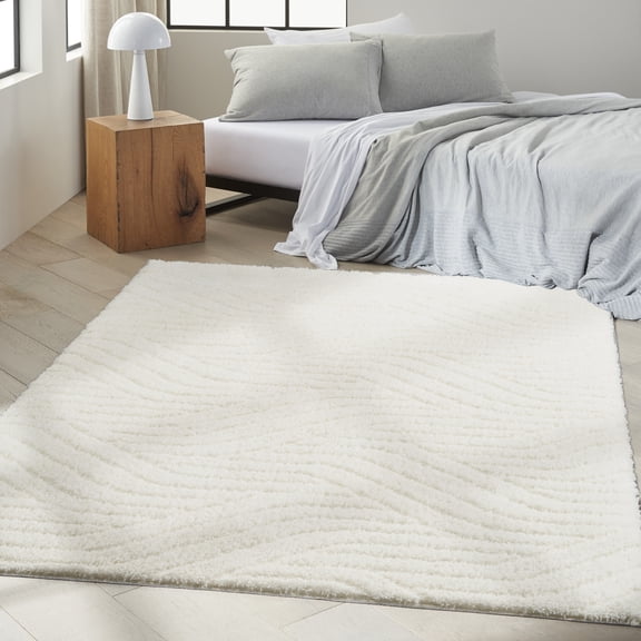 Nourison Surfaces Solid Ivory 3'11" x 5'11" Area Rug (4x6)