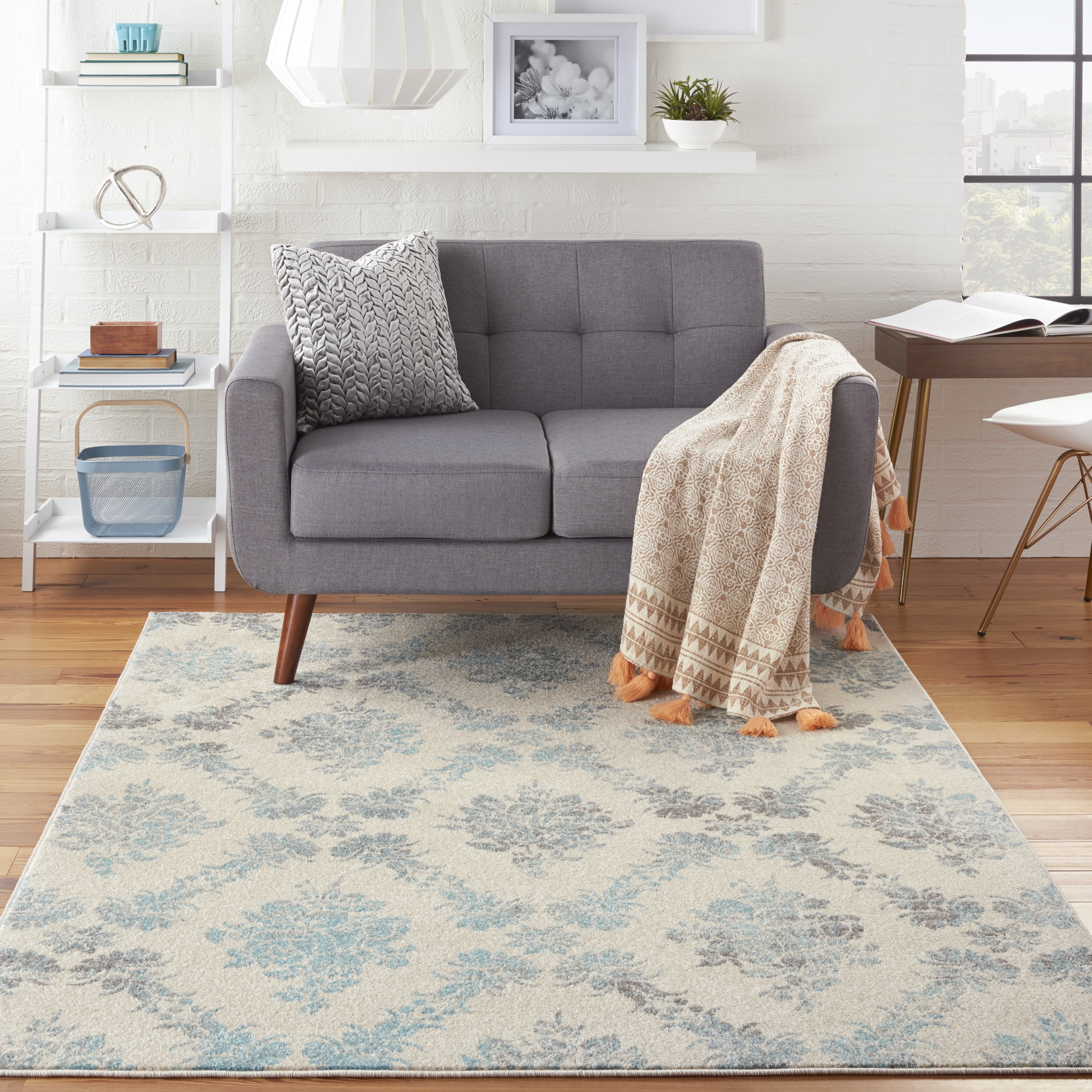 Ivory and Turquoise Floral Synthetic 4' x 6' Area Rug