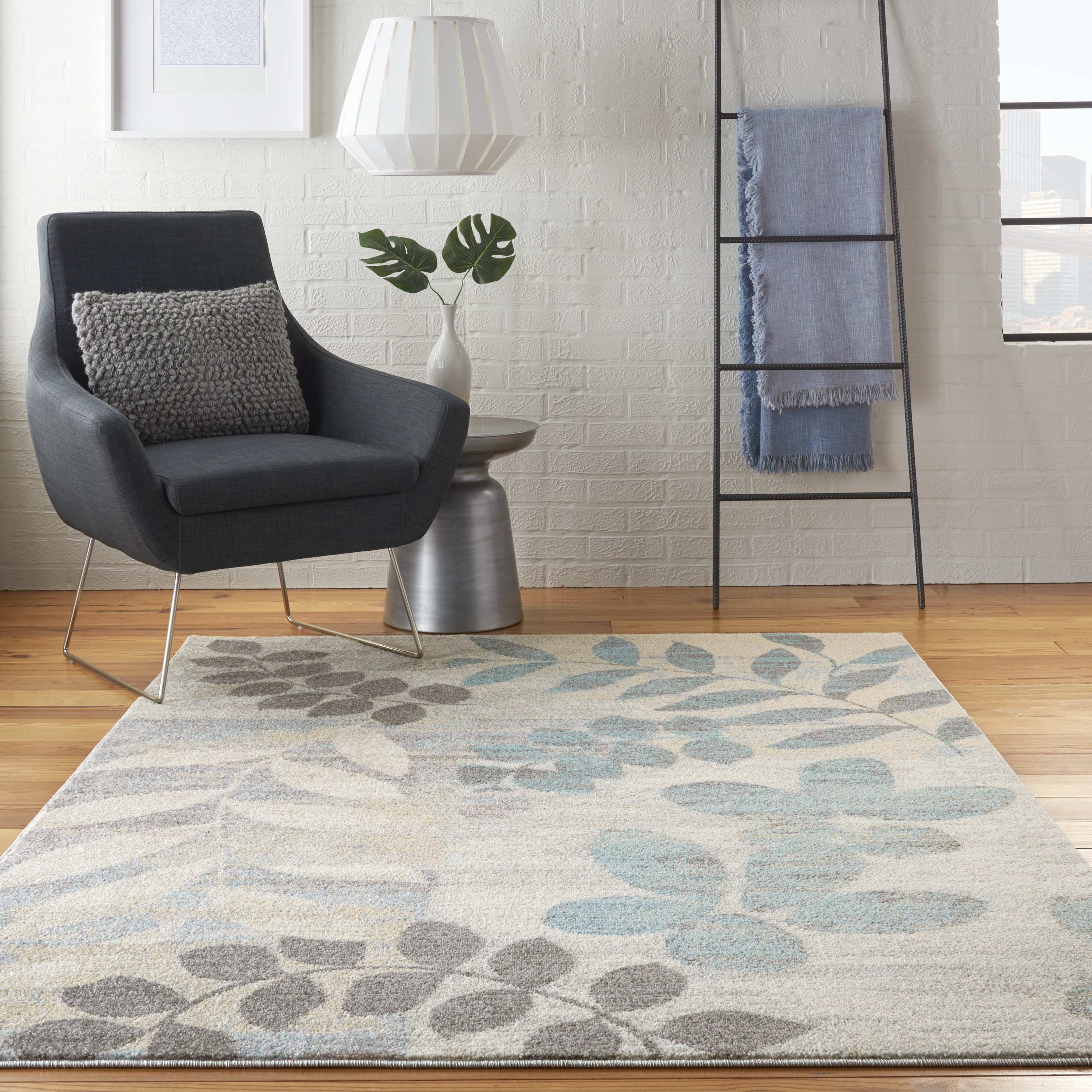 Ivory and Light Blue Floral Synthetic 5' x 7' Area Rug