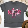 thumbnail image 1 of Nurse Graphic T-Shirt | Pink Bow and Heart Medical Icons Tee, Dark Heather, Size L, 1 of 6