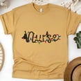 thumbnail image 1 of Nurse Graphic T-Shirt with String Lights Design, Unisex Casual Tee, Gold, Size XL, 1 of 6