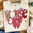 thumbnail image 1 of Nurse Valentine Sweatshirt, Glitter Heart Coquette Nurse Pullover, Cute Pink Valentine’s Day Sweater for Nurses, Brushstroke Medical Shirt, 1 of 5