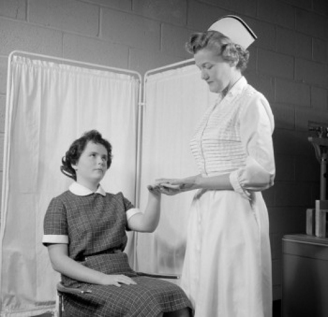Nurse examining girl in hospital Canvas Art - (18 x 24)
