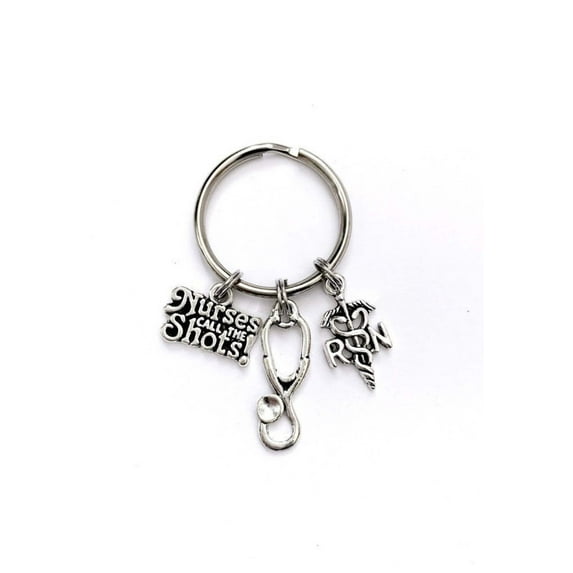 Nurse themed keychain. Includes Nurses Call the Shots, a Stethoscope, and Caduceus. Nurse Appreciation gift.