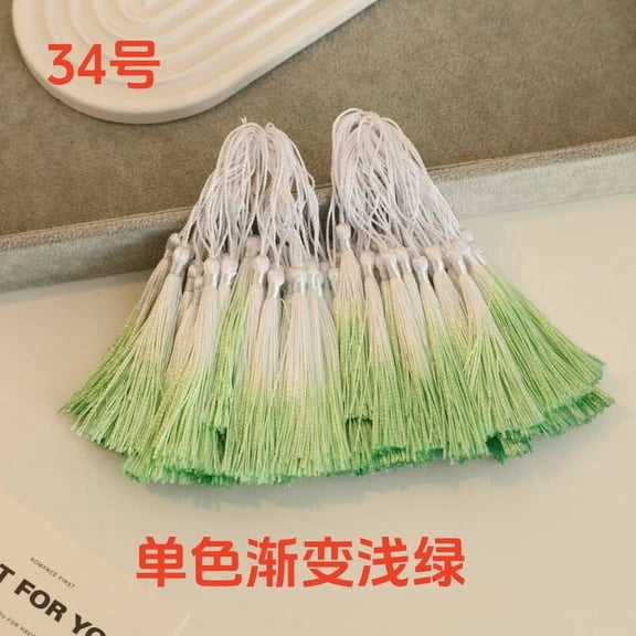 Nvzi 50 pieces of Light Green handmade tassels, 3 inches long, with looped craftsmanship. The tassels are soft and durable, suitable for DIY earrings, bookmarks, and holiday decorations