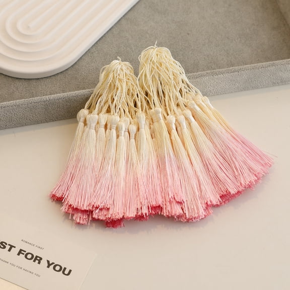 Nvzi 50 pieces of Yellow-Pink handmade tassels, 3 inches long, with looped craftsmanship. The tassels are soft and durable, suitable for DIY earrings, bookmarks, and holiday decorations
