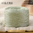 thumbnail image 1 of Nvzi high-quality crochet yarn, bamboo fiber,100g,1 roll, suitable for shawls, scarves,clothes,cushions, gentle and non irritating, Suitable for crocheting ,suitable for all seasons,light green, 1 of 4