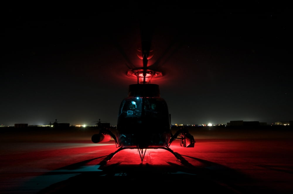 OH-58D Kiowa pilots run through their pre-flight checks before taking off Canvas Art - Terry MooreStocktrek Images (18 x 12)