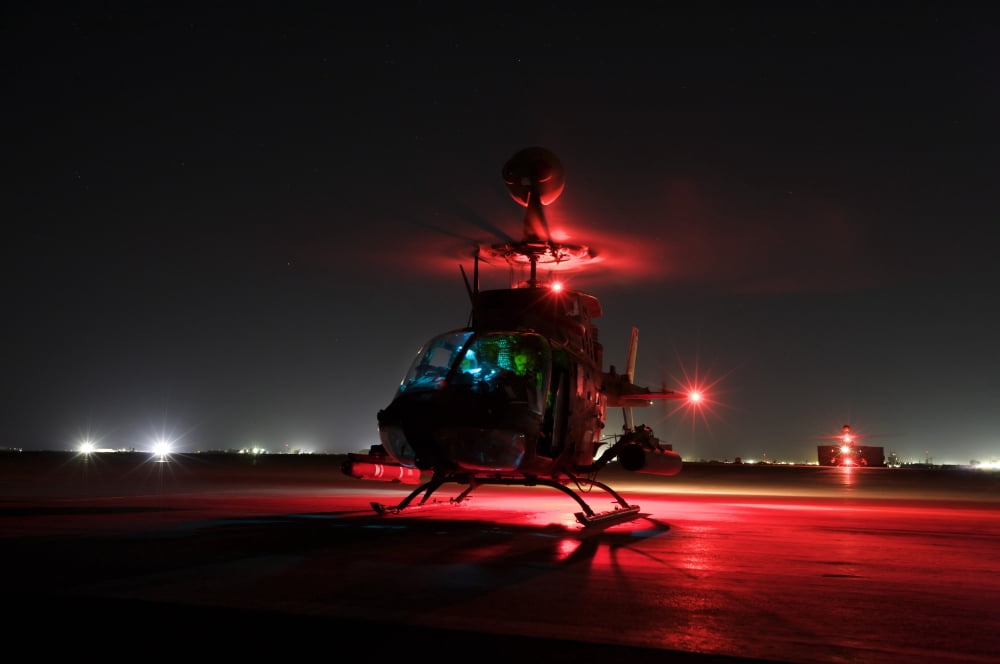 OH-58D Kiowa pilots run through their pre-flight checks before taking off Canvas Art - Terry MooreStocktrek Images (18 x 12)
