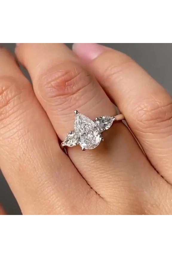 2.70 Ct Pear Cut Moissanite Three Stone Engagement Ring in 14K White Gold Plated