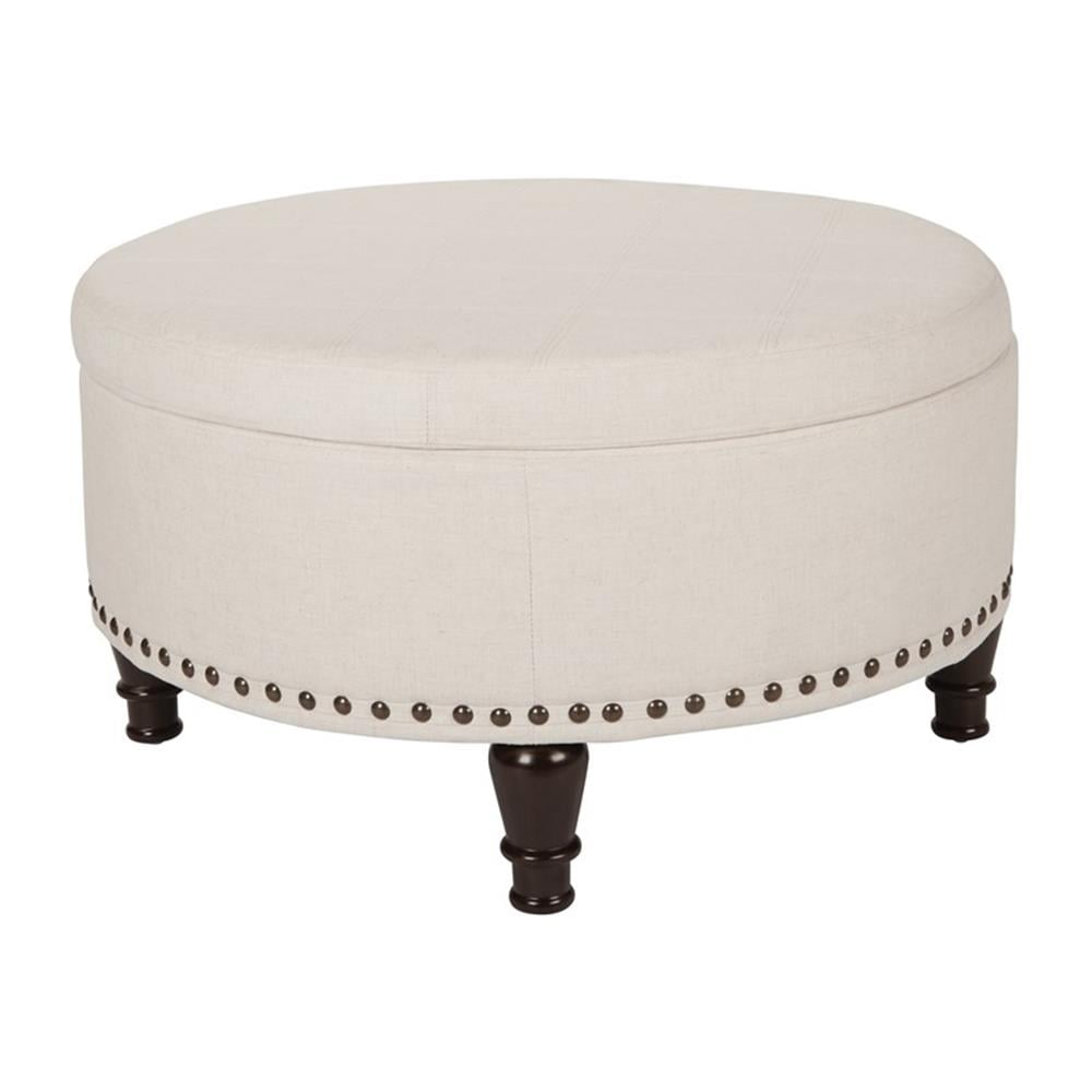 OSP Home Furnishings Augusta Round Storage Ottoman in Linen Fabric with decorative nailheads