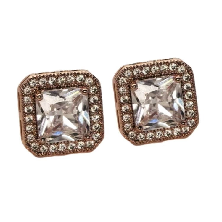 Silver and rhodium plated cubic zirconia stud earrings in a claw