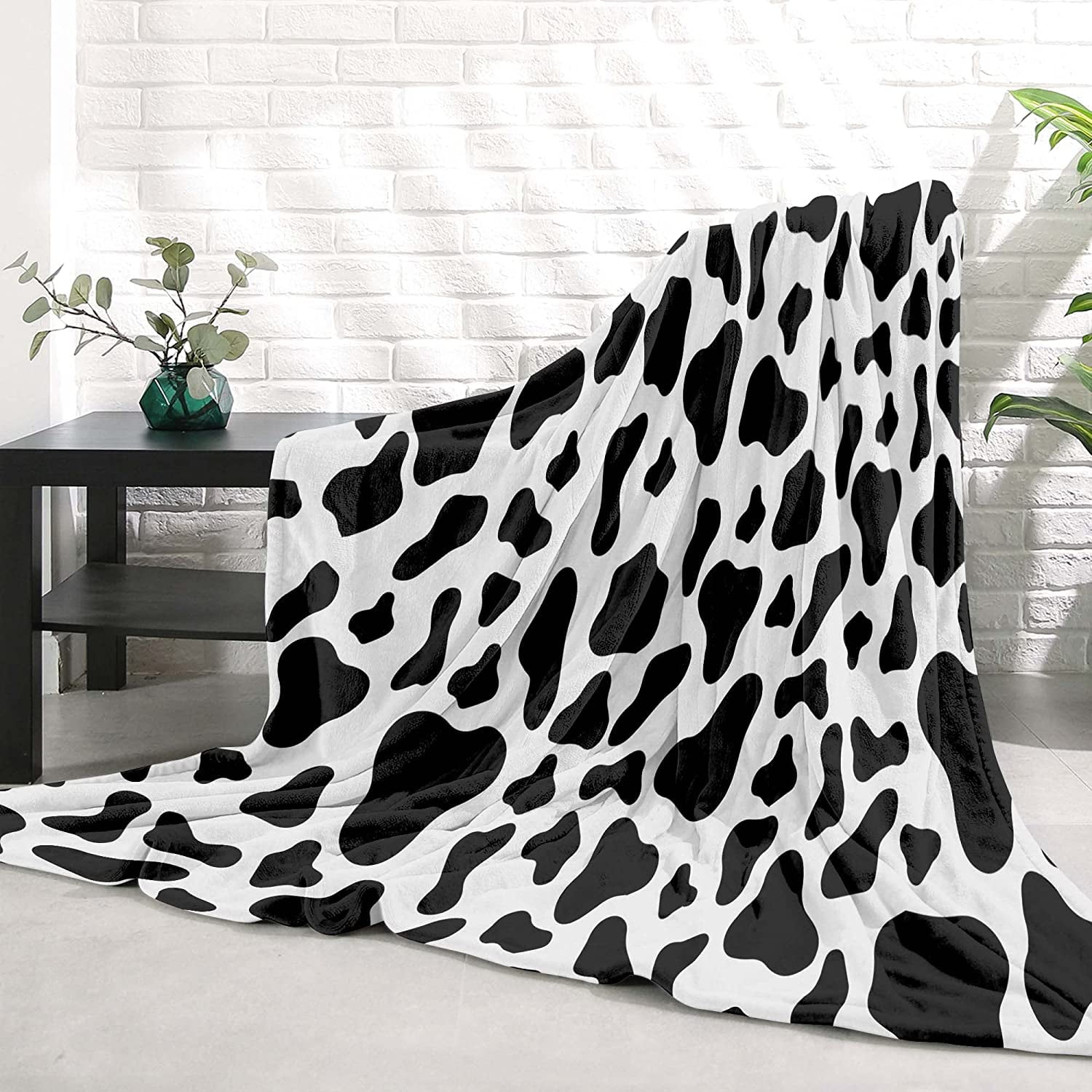 Black and white cow print throw sale