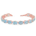 thumbnail image 1 of OVAL GENUINE BLUE TOPAZ (9 X 7) TENNIS BRACELET IN ROSE GOLD :  10K  8.5", 1 of 1