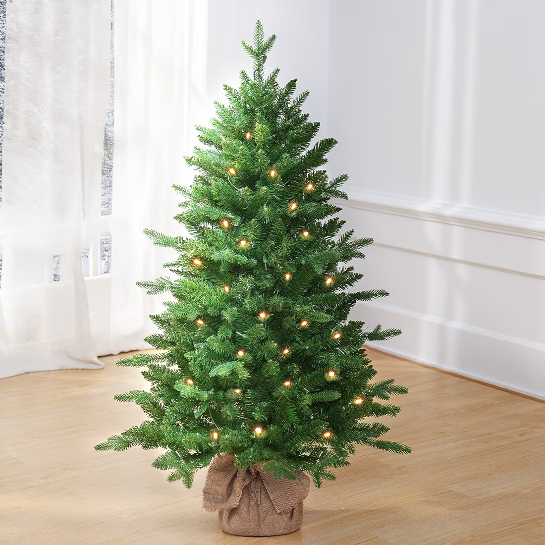 OasisCraft 3ft Pre-lit Artificial Mini Christmas Tree Includes Small Lights and Cloth Bag Base for Tabletop or Desk Burlap Green